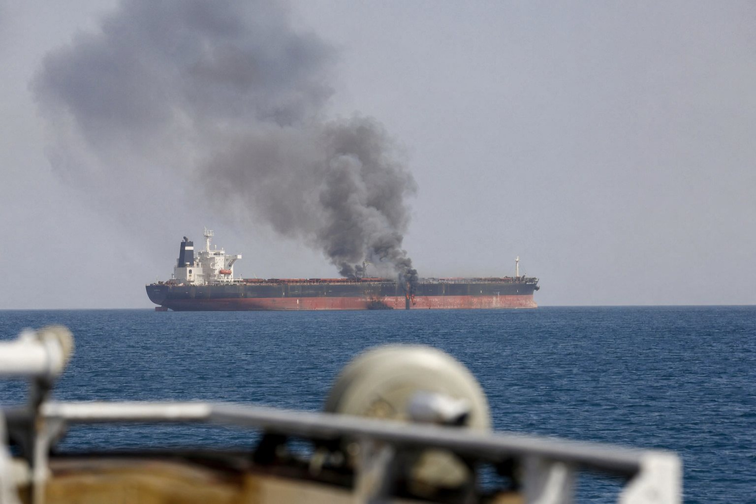Cargo ship attacked near Strait of Hormuz, crew safe, no claim of ...