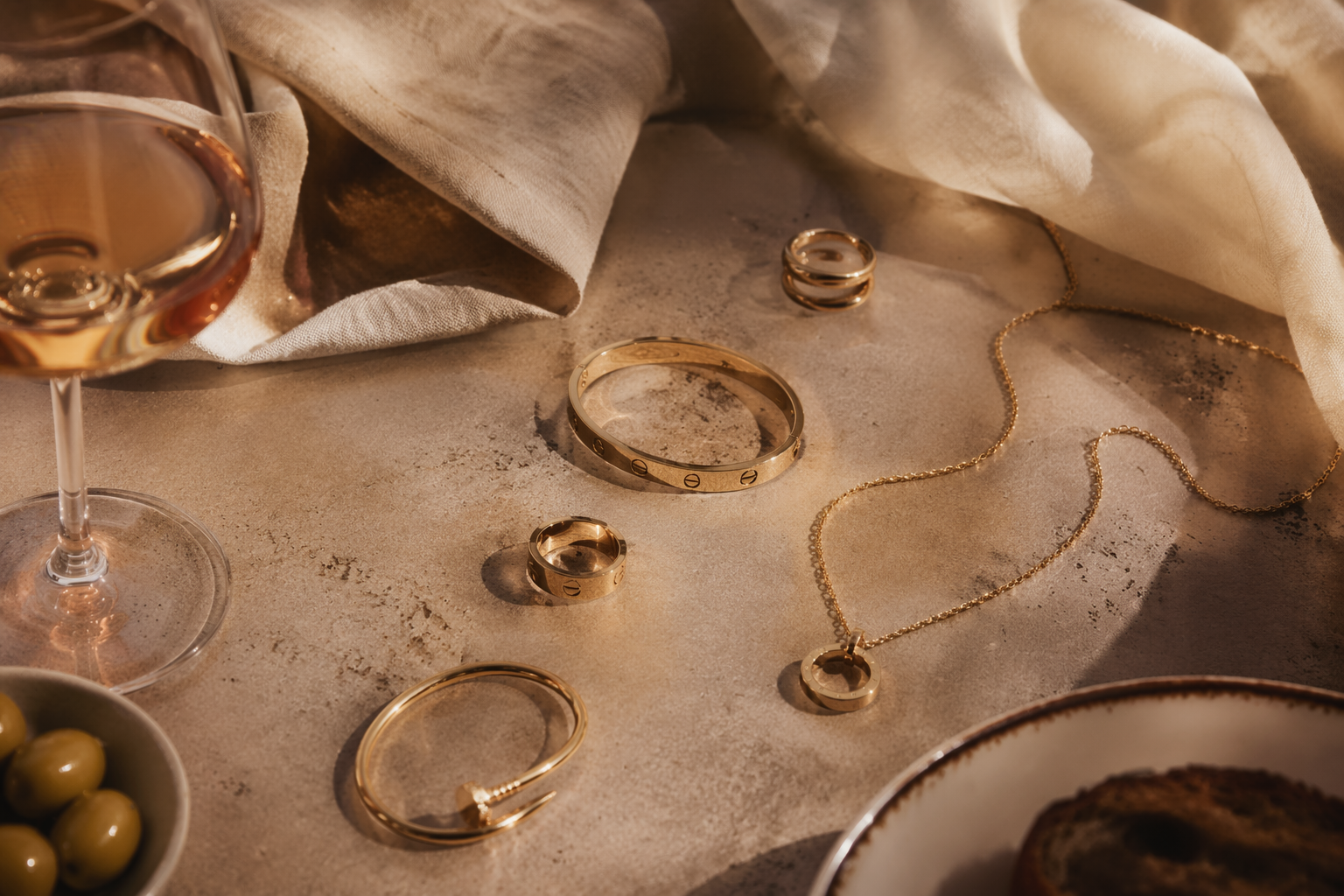 Cartier jewelry elevates sunset dinner looks with sculptural shine ...